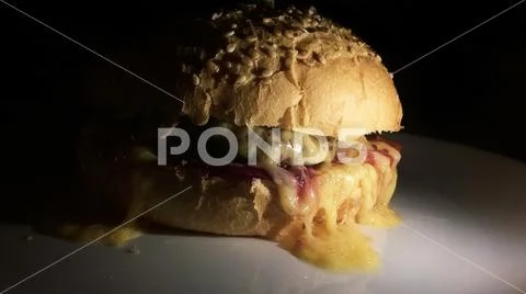 Hot burger on a plate. Stock Photos