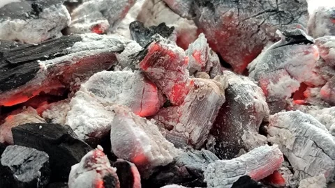 Hot burning charcoal with red embers and white ash Видео 336877260