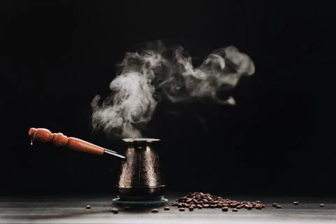 Hot cereal, black coffee in Turku, with steam on a  background Stock Photos