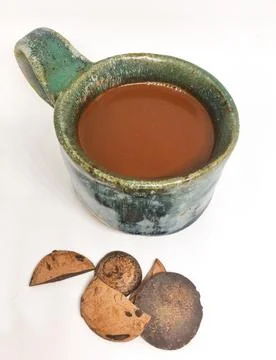 Hot ceremonial cacao in a blue mug Stock Photos