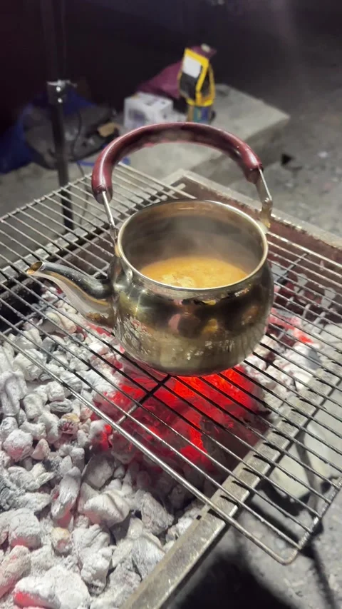 HOT CHARCOILS TEA Video stock 327835625