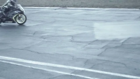 Hot chase of two bikes at the race, bike fragment Slow Motion Stock Footage 70322323