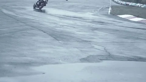 Hot chasing sharp turn in the motorcycle racing Stock Footage 70320618