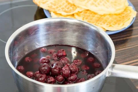 Hot cherries in the pot Stock Photos