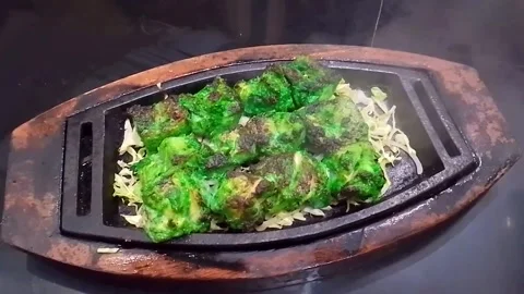 Hot Chicken Fried Green Boti with smoke upcoming Stock Footage 264963418