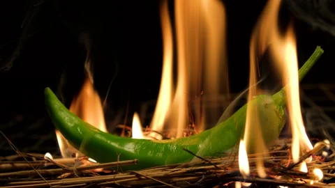 Hot chili pepper on fire Stock Footage 137825783