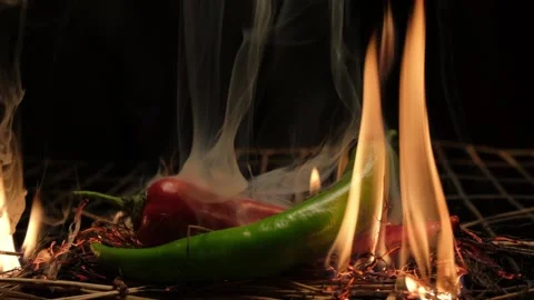 Hot chili pepper on fire Stock Footage 137825844