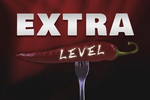 Hot chili peppers on fork. Extra spicy. Mexican food with pepper. Seasoning.. Stock Photos