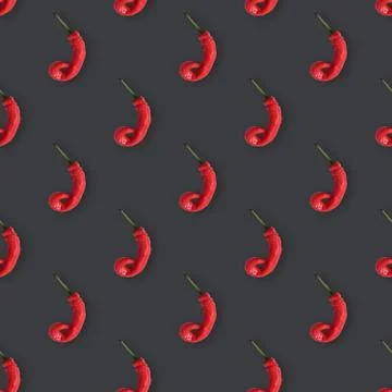 Hot chili peppers seamless pattern on black background Stock Illustration
