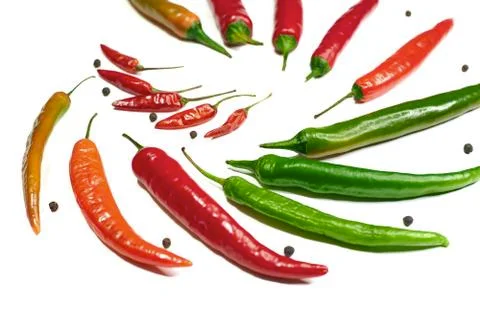 Hot chilli on a white background close-up from the top side Stock Photos