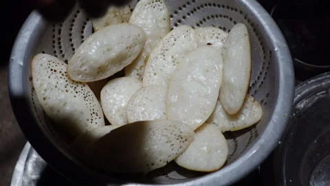 The hot chitai pitha closeup views, made by mixing rice flour Stock Footage 341698563