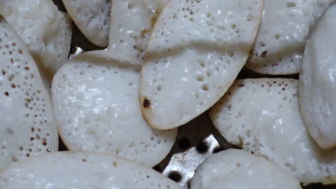 The hot chitai pitha closeup views, made by mixing rice flour Stock Footage 341698564