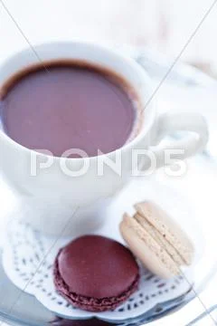 Hot chocolate and macaroons Stock Photos