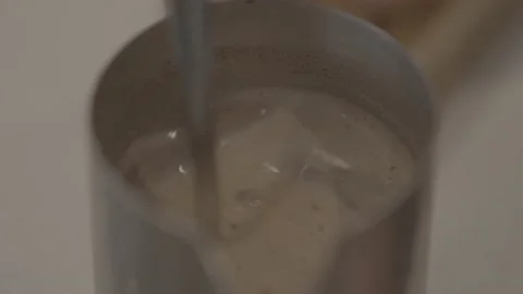 Hot chocolate being mixed, hot beverage, coffee, tea Stock Footage 201469501