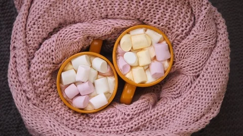 Hot Chocolate With Marshmallow In Two Cups Wrapped In Pink Knitted Plaid. Stock Footage 122250865
