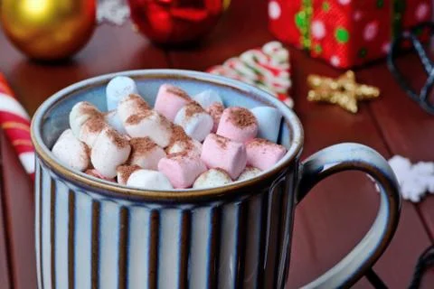 Hot chocolate in a mug on a wood table Stock Photos