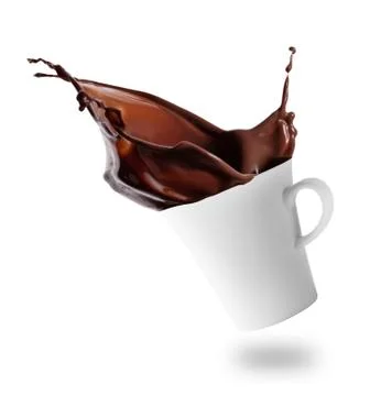 Hot chocolate splashes out of tilted white cup Stock Photos