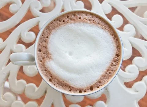 Hot chocolate in white cup Stock Photos