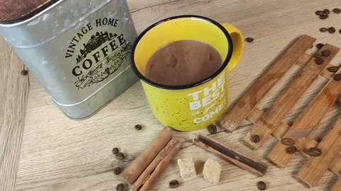 Hot chocolate in a yellow mug Stock Footage 223568757