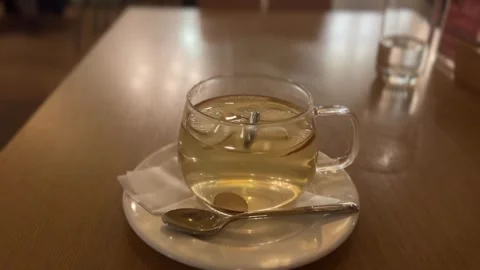 Hot Clear Apple Cinnamon Tea Glass Mug Stock Footage 344319384
