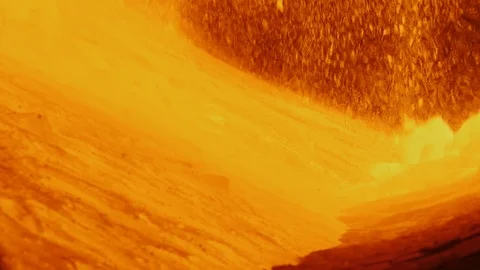 Hot clinker tumble and flow inside of rotary burning kiln. Production process. Video stock 121638898