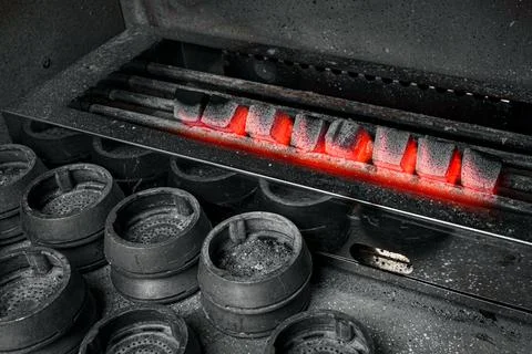 Hot coal for hookah. Stock Photos