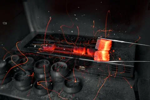 Hot coal for hookah. Stock Photos