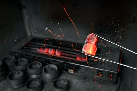 Hot coal for hookah. Stock Photos