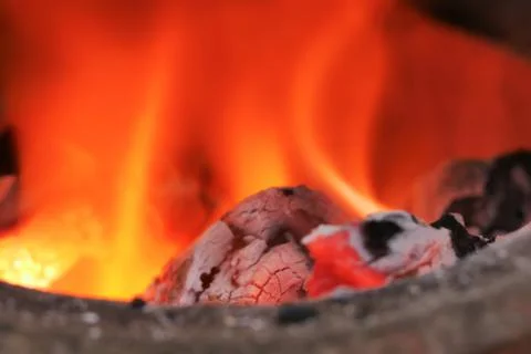 Hot coals in the fire Stock Photos