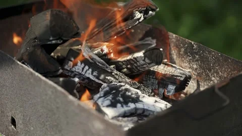 Hot coals in the grill in summer Stock Footage 204814904