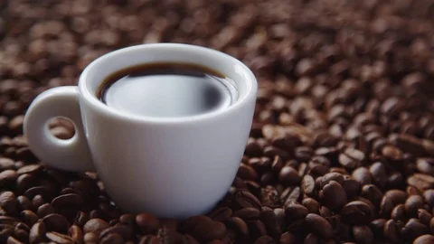 Hot coffee and roasted coffee beans Stock Footage 81286474