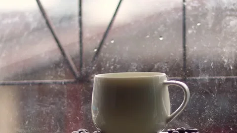 Hot coffee and roasted coffee beans on the table. Stock Footage 163569679