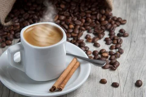 Hot coffee with cinnamon. Stock Photos