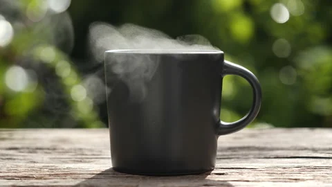 Hot Coffee Cup and Coffee Beans. Close-up beautiful natural steaming smoke Stock Footage 218308024