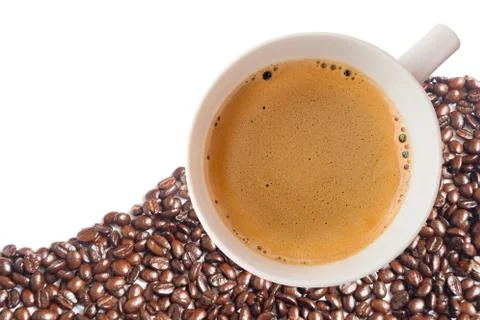 Hot coffee cup with clipping path and coffee beans top view on white backgrou Stock Photos