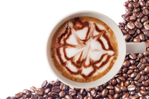 Hot coffee cup with clipping path and coffee beans top view on white backgrou Stock Photos
