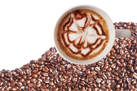 Hot coffee cup with clipping path and coffee beans top view on white backgrou Stock Photos