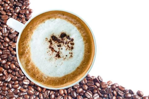Hot coffee cup with clipping path and coffee beans top view on white backgrou Stock Photos