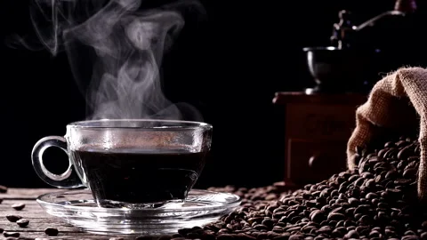 Hot Coffee Cup Concept. Close-up glass coffee cup with  steaming smoke Stock Footage 205216354