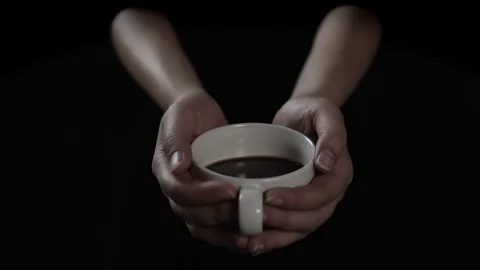 Hot coffee cup in hands, slow motion footage Stock-Footage 105003776
