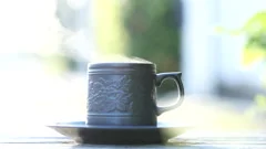 https://images.pond5.com/hot-coffee-cup-natural-steam-footage-172389453_iconm.jpeg