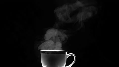 Hot coffee cup with steam float up from cup on dark background Stock Footage 165310983