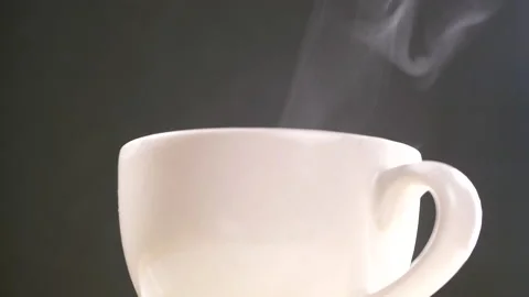 Hot coffee cup steaming in slow motion Stock Footage 140666549