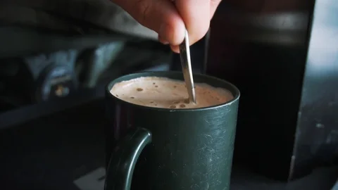 Hot Coffee Getting Stirred Oustide Stock Footage 96165693