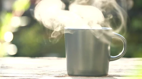 https://images.pond5.com/hot-coffee-mug-close-natural-footage-237407905_iconl.jpeg