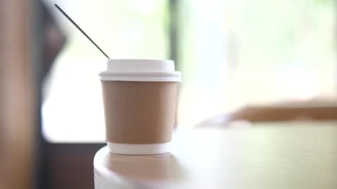 Hot Coffee in a Mug on the Desk, Aromatic Start to the Day in a Cozy Workspace Stock Footage 246923792