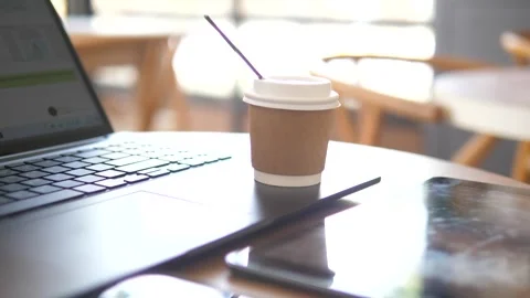 Hot Coffee in a Mug on the Desk, Aromatic Start to the Day in a Cozy Workspace Stock Footage 246923809
