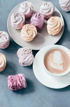 Hot coffee with pink marsmallow on gray background St. Valentine Day concept Stock Photos