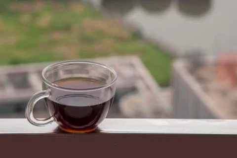 Hot coffee placed on the balcony Stock Photos