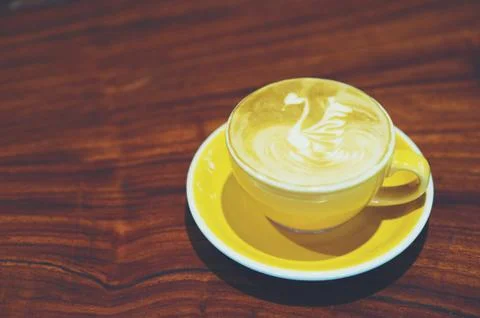 Hot coffee is placed in the same table in the morning of every day. Coffee at 스톡 사진